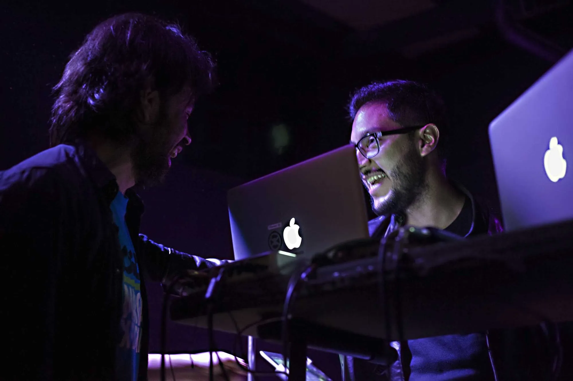 Horacio live next to another musician with laptops and keys