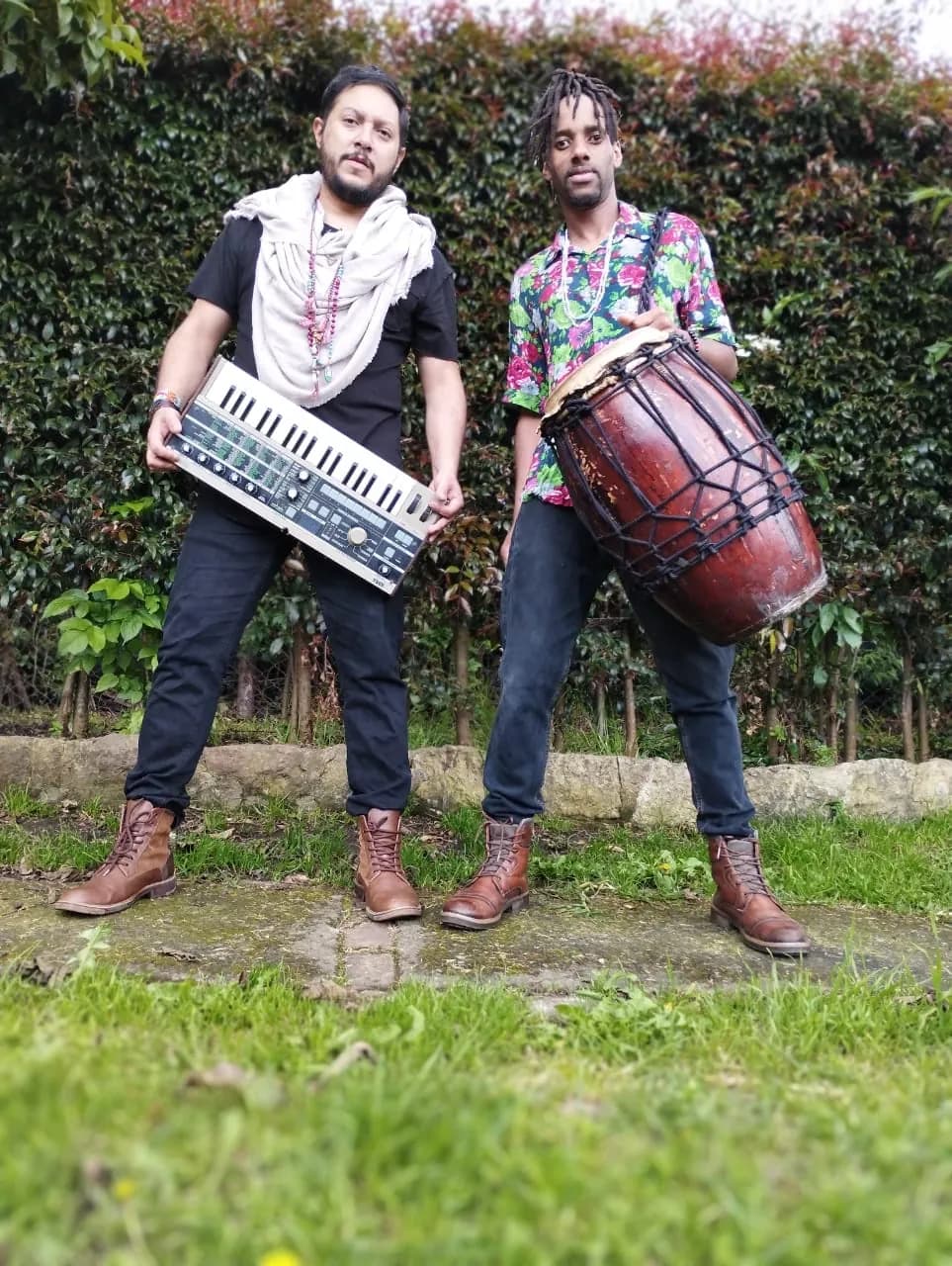 Lumbu & Kuntur: Horacio with a synth and a percussionist with a drum (7)