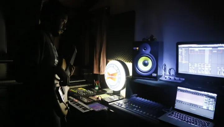 HOB studio with monitors, synths and Ableton Live